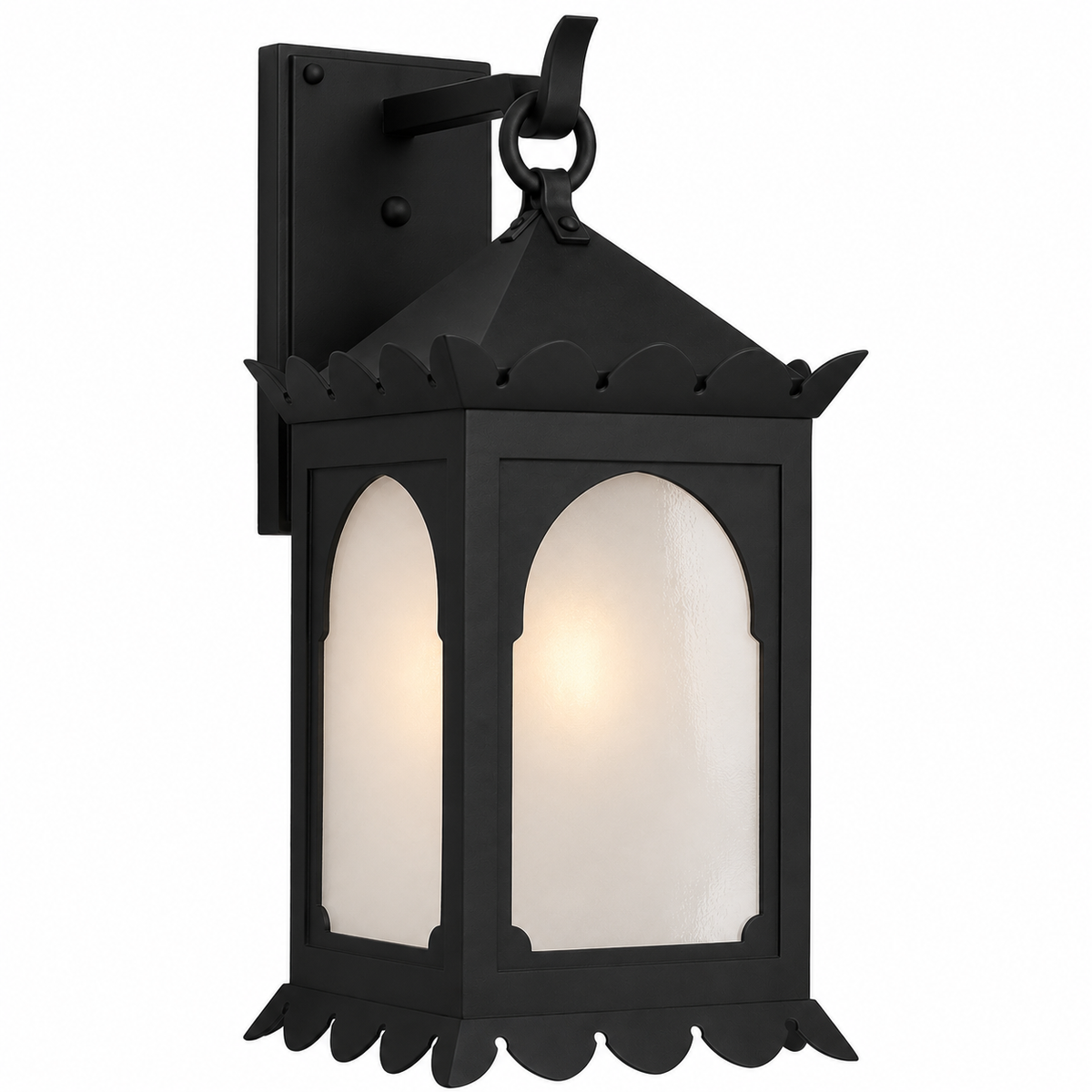 A black metal outdoor wall sconce with scalloped trim and frosted glass panels, shown lit against a plain white background.